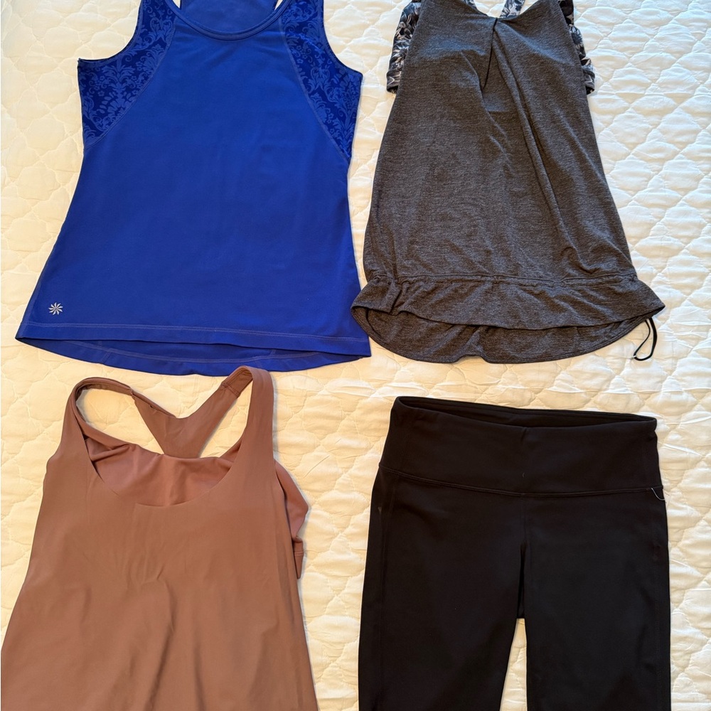 Athleta Blue, Gray, and Brown Tank Tops and bottoms.